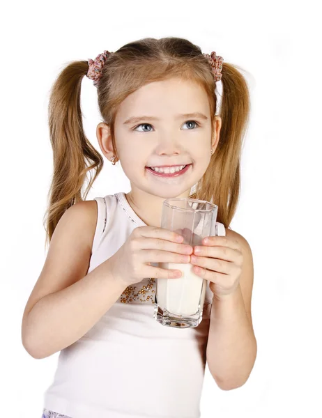 Cute little girl is drinking milk isolated — Stock Photo, Image