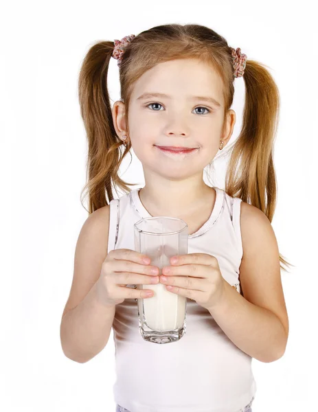 Cute little girl is drinking milk isolated — Stock Photo, Image