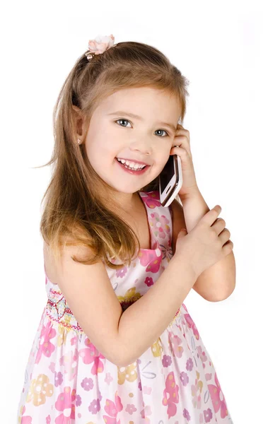 Šťastná holčička mluví do mobilu — Stock fotografie