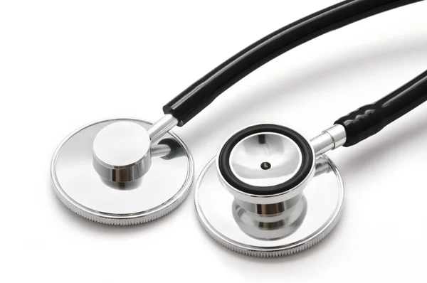 Two black stethoscopes isolated on white — Stock Photo, Image