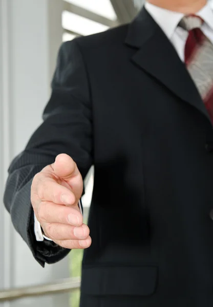 Businessman male hand reached to seal the agreement — Stock Photo, Image