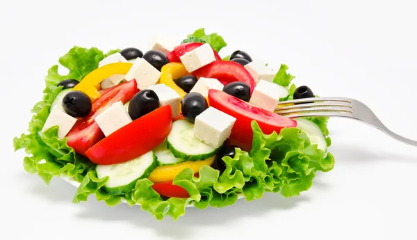 Ensalada de verduras frescas con tenedor aislado —  Fotos de Stock