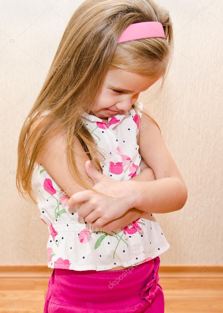 Portrait of disobedient crying little girl