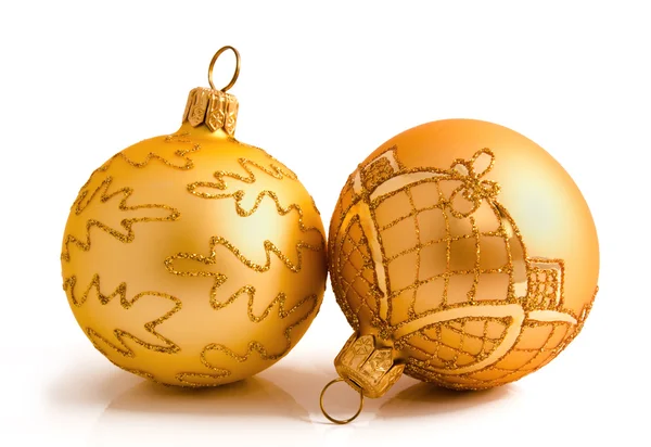 Two golden christmas balls isolated on a white — Stock Photo, Image