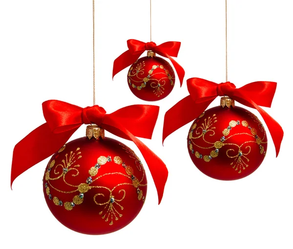 Red christmas balls with ribbon isolated on a white — Stock Photo, Image