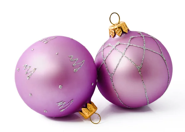 Two lilac christmas balls isolated on a white Stock Image