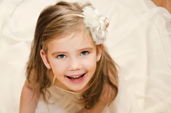 Happy adorable little girl in princess dress Stock Photo