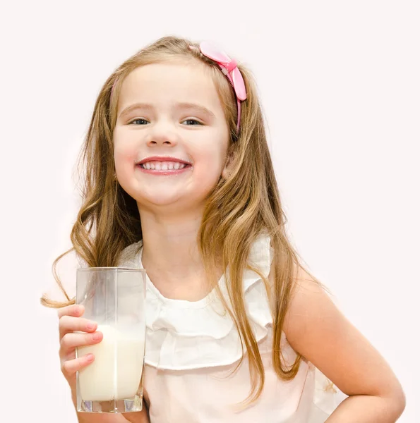 Happy cute little girl with glass of milk — Stock Photo, Image