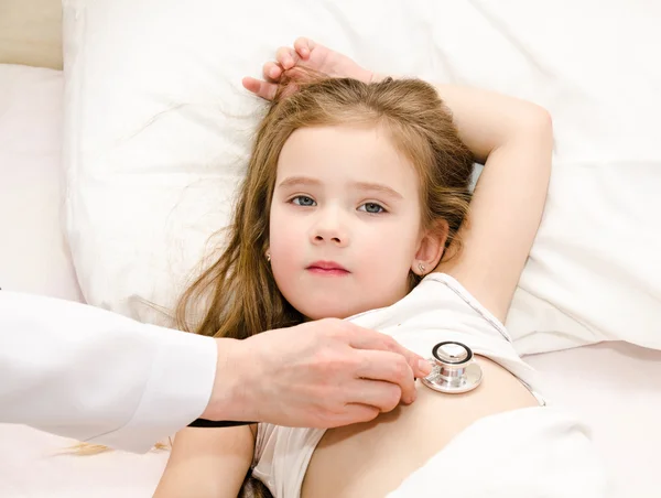 Little girl and the doctor for a checkup examined Stock Photo