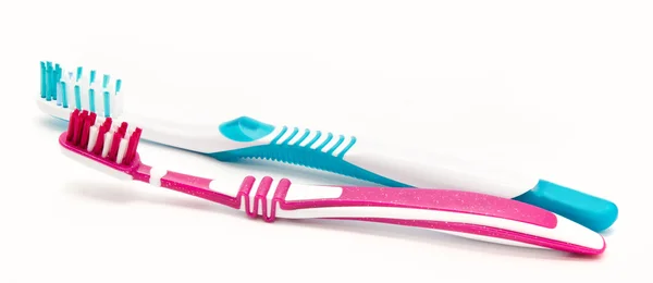 Två tandborstar isolerad på vit bakgrund — Stockfoto