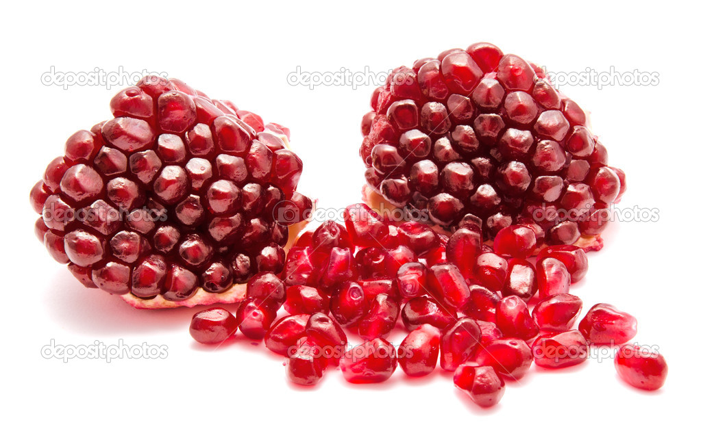 Ripe pomegranate fruit seeds isolated on a white