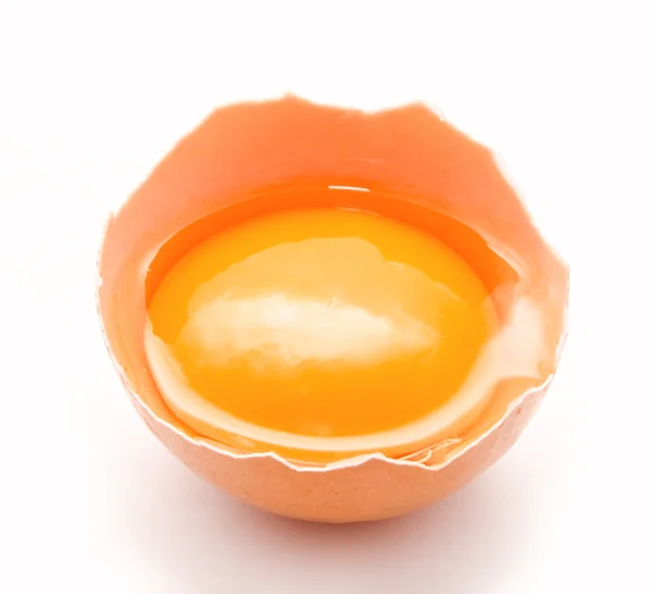 Broken chicken egg and yolk isolated on a white — Stock Photo, Image