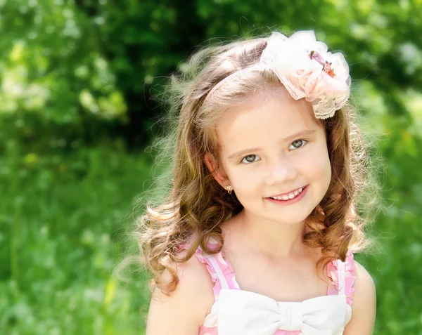 Portrait of adorable smiling little girl — Stock Photo, Image