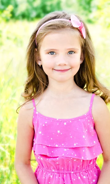 Portrait of adorable smiling little girl — Stock Photo, Image