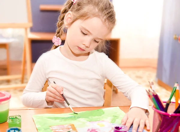 Cute little girl drawing Stock Image