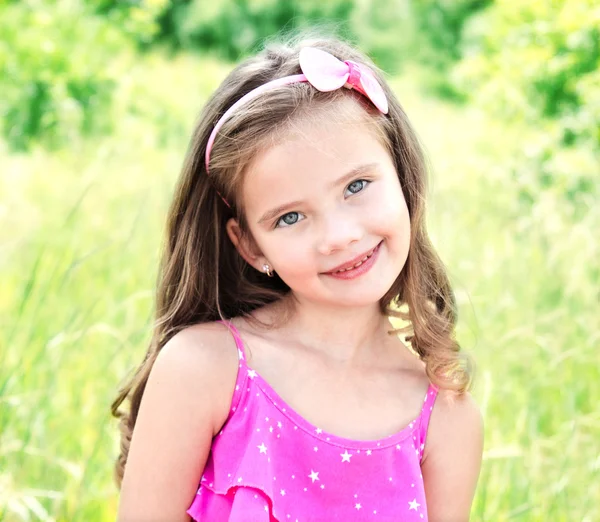 Portrait of adorable smiling little girl — Stock Photo, Image