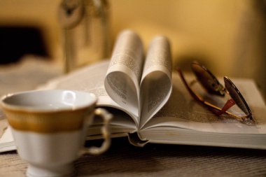 reading a book and coffee