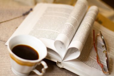 reading a book and coffee