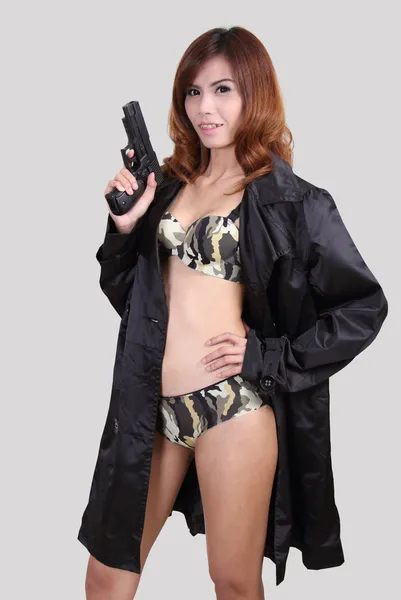 Mujer y arma —  Fotos de Stock