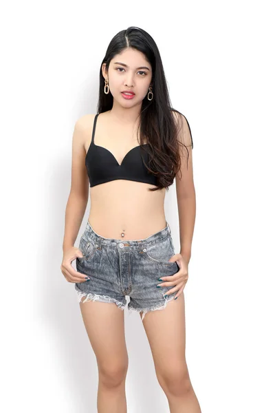 Imagen Mujer Con Sujetador Negro Jeans Sobre Fondo Blanco Estudio —  Fotos de Stock