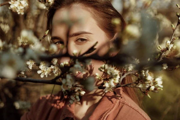 Woman Looking Blossomed Branches Camera — 图库照片