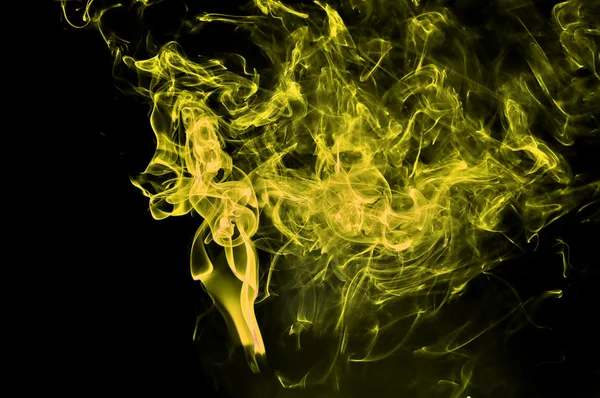 Humo amarillo abstracto sobre fondo negro. —  Fotos de Stock