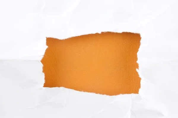 Papier déchiré Againts fond orange — Photo