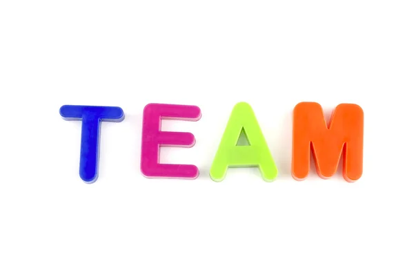 Word Team From Plastic Toys Letters — Stock Photo, Image