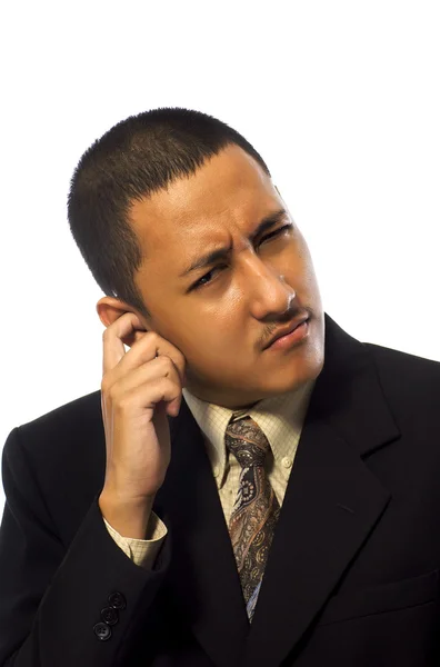 Muž škrábat za uchem — Stock fotografie