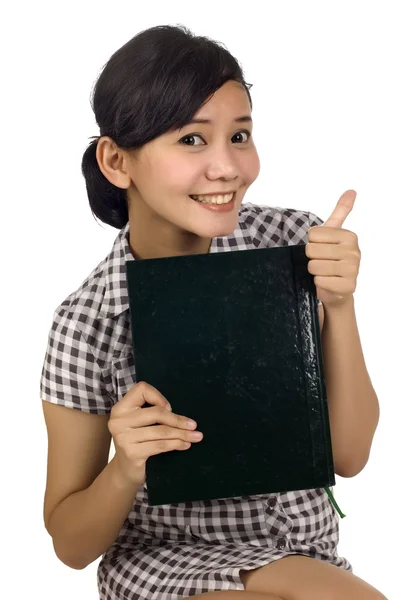 Mujer sostener libro y pulgar hacia arriba — Foto de Stock