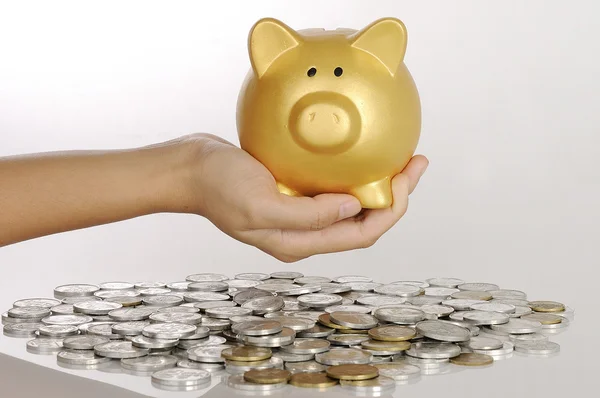 Hand Holding Golden Piggy Bank — Stock Photo, Image