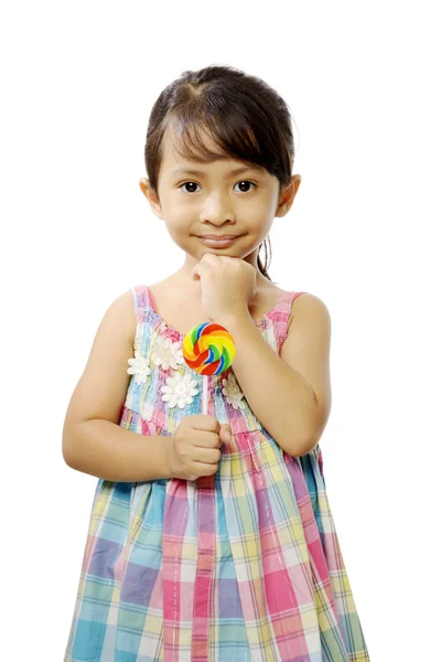 Schattig klein meisje eten lolly — Stockfoto