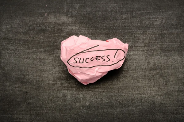 Success writing on crumpled paper — Stock Photo, Image