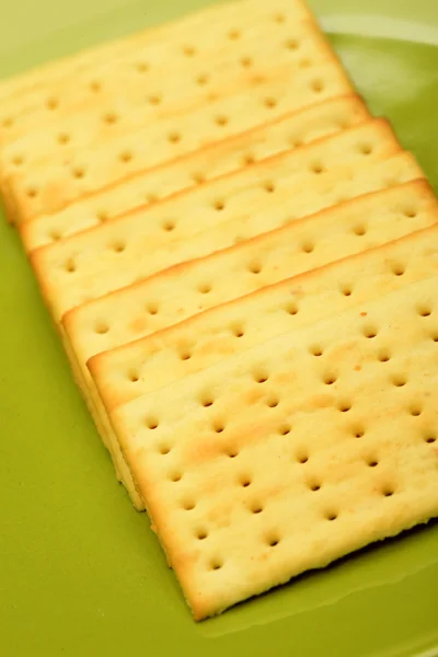 Galletas en el tazón verde —  Fotos de Stock