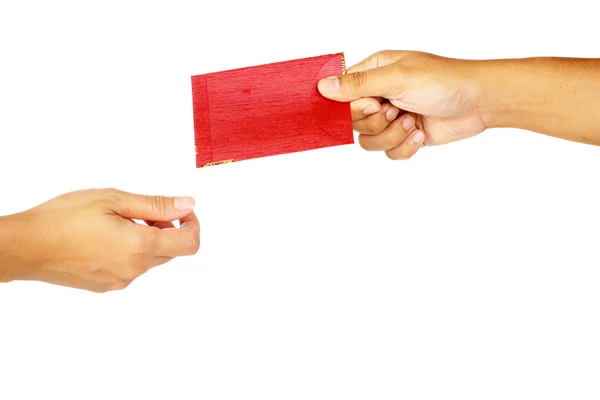 El tutma kırmızı zarf — Stok fotoğraf