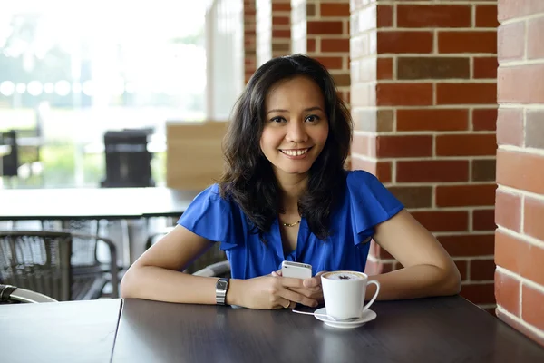 Attractive woman in cafe — Stock Photo, Image