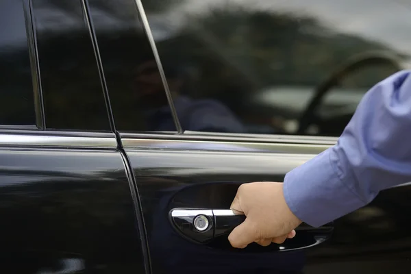 Man hand on handle — Stock Photo, Image