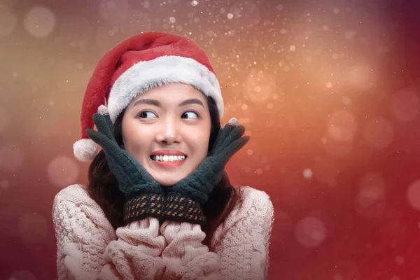 Asian Woman Winter Gloves Santa Hat Standing Blurred Light Background — Stock Photo, Image