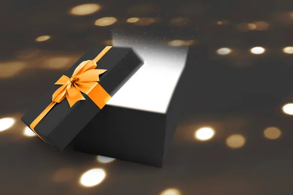 Відкрита Чорна Подарункова Коробка Золотою Стрічкою Розмитим Світлим Фоном — стокове фото