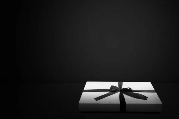 White Gift Box Cap Black Ribbon Black Background Black Friday — Stock Photo, Image