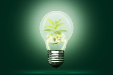 Yeşil yapraklar ve ampulün içinde 2022. Mutlu yıllar 2022