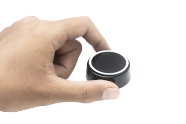 Human hand turning a knob isolated over white background