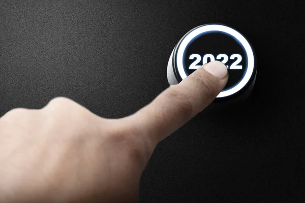Human Hand Pushes 2022 Button Happy New Year 2022 — Stockfoto