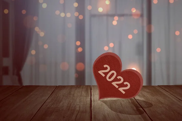 2022 Red Heart Wooden Table Blurred Light Background Happy New — Fotografia de Stock
