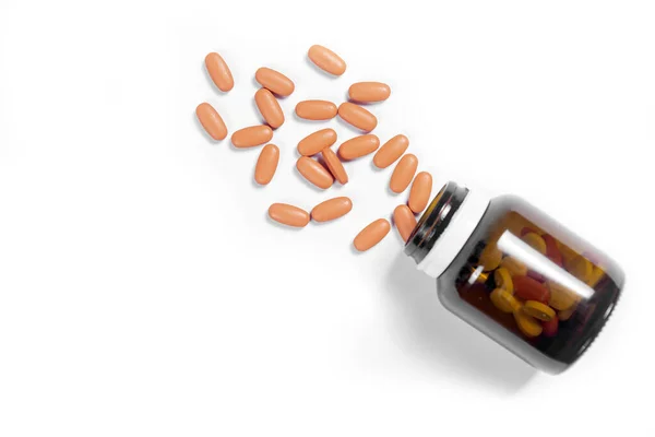 Tablety Pilulky Vysypat Kontejneru Izolované Přes Bílé Pozadí — Stock fotografie