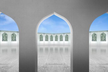 Caminin içini beyaz duvarda güzel bir deseni olan cami kapısından görmek.