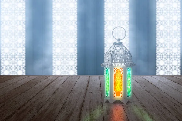 Arabic lamp with colorful light on wooden table in the mosque