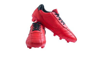 Kırmızı futbol ayakkabıları beyaz arkaplanda izole edilmiş