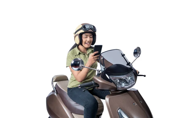 Asian Woman Helmet Sitting Scooter While Using Mobile Phone Isolated — Fotografia de Stock