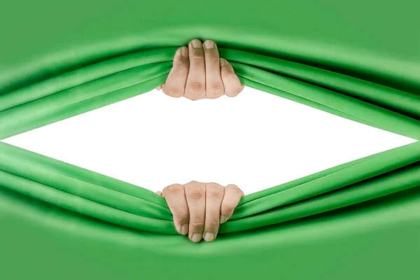 Human hand opening green curtain with white background